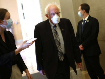 Sen. Bernie Sanders walks to a Democratic policy luncheon at the U.S. Capitol on September 14, 2021, in Washington, D.C.