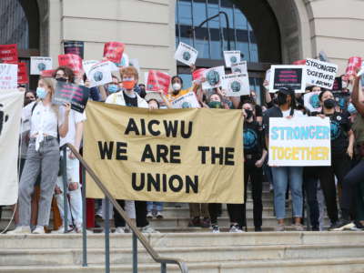 Protesters show support for the AICWU union organizing effort at a rally on September 9, 2021, outside the Art Institute of Chicago in downtown Chicago, Illinois.