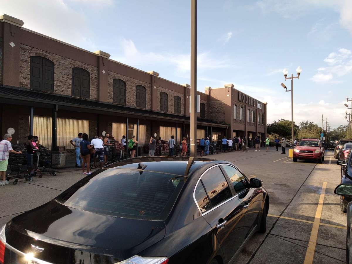 New Orleanians line up for groceries following Hurricane Ida.