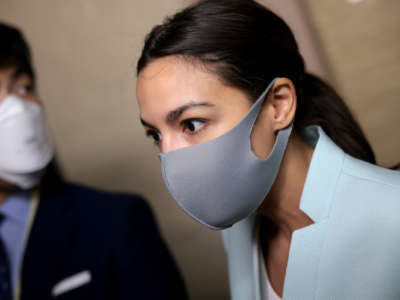 Rep. Alexandria Ocasio-Cortez (D-New York) speaks to reporters before a House Democratic caucus meeting at the U.S. Capitol on October 01, 2021 in Washington, D.C.