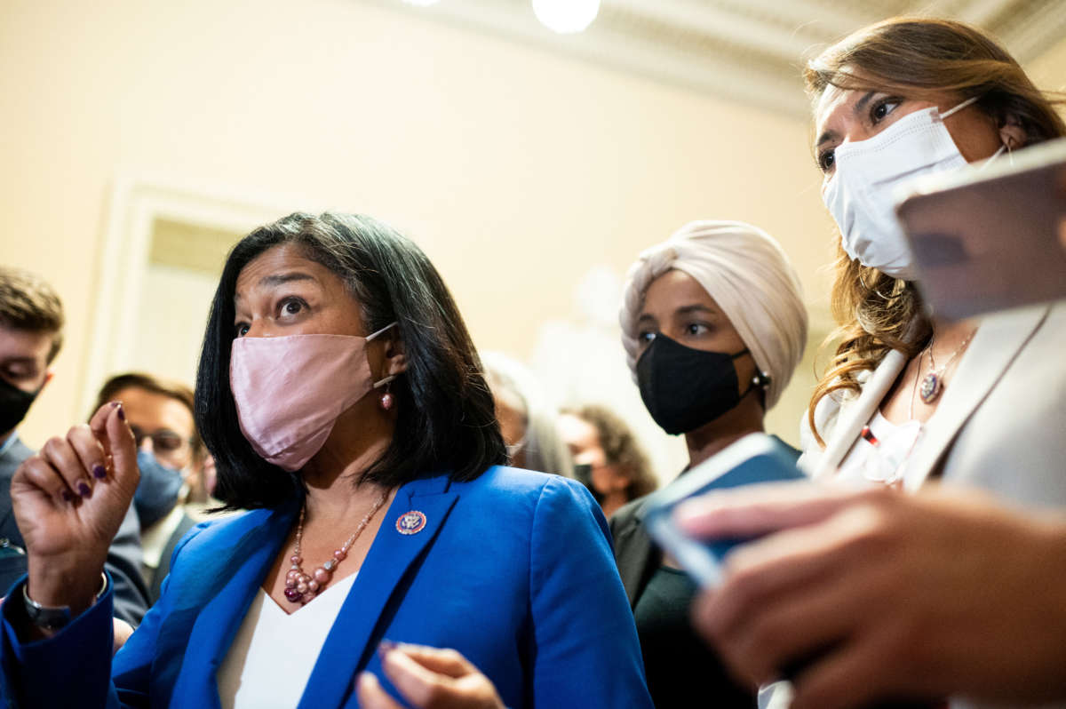 From left, Progressive Caucus chair Rep. Pramila Jayapal, Rep. Ilhan Omar and Rep. Veronica Escobar speak to reporters after meeting with Speaker of the House Nancy Pelosi on the infrastructure and reconciliation bills on September 30, 2021.