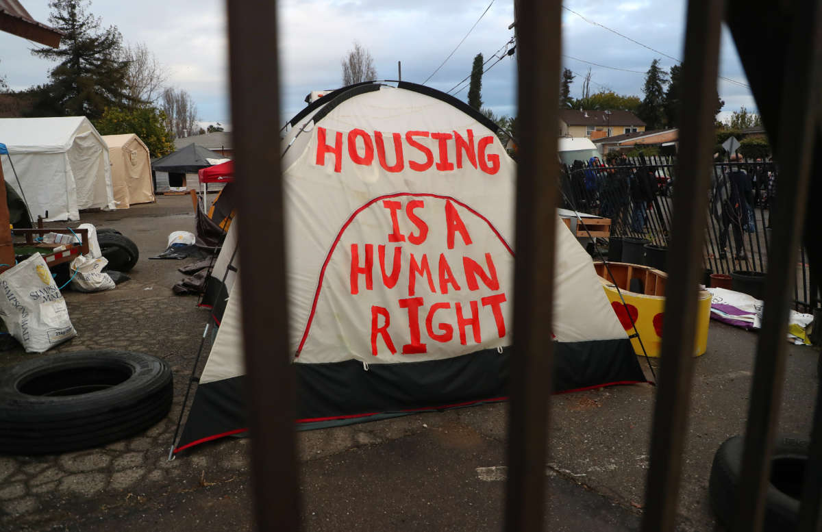 A tent is photographed at a homeless encampment at the corner of Edes and Elmhurst Avenues on December 5, 2018, in Oakland, California.