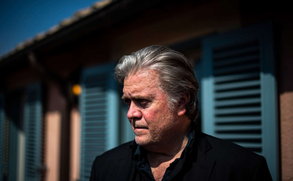 Former White House Chief Strategist Steve Bannon speaks with Raheem Kassam on his terrace at Hotel de Russie on September 22, 2018, in Rome, Italy.