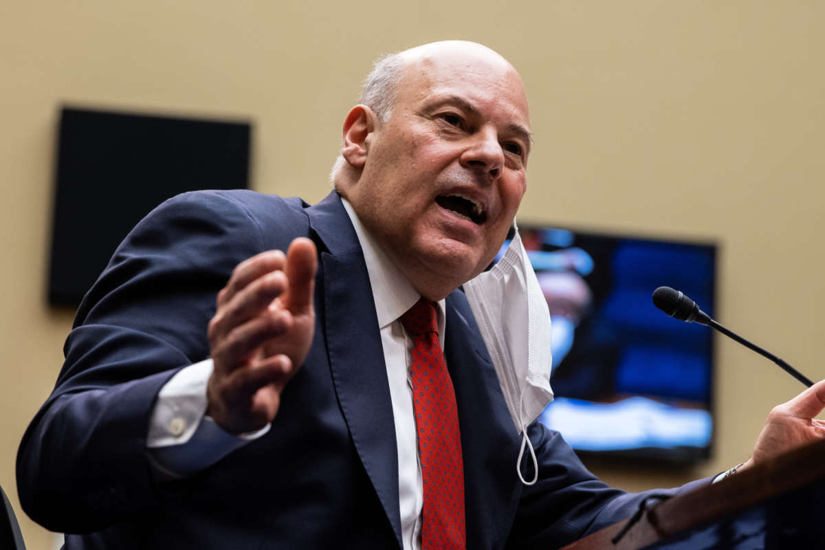 United States Postmaster General Louis Dejoy speaks during a House Committee on Oversight and Reform hearing on February 24, 2021, on Capitol Hill in Washington, D.C.