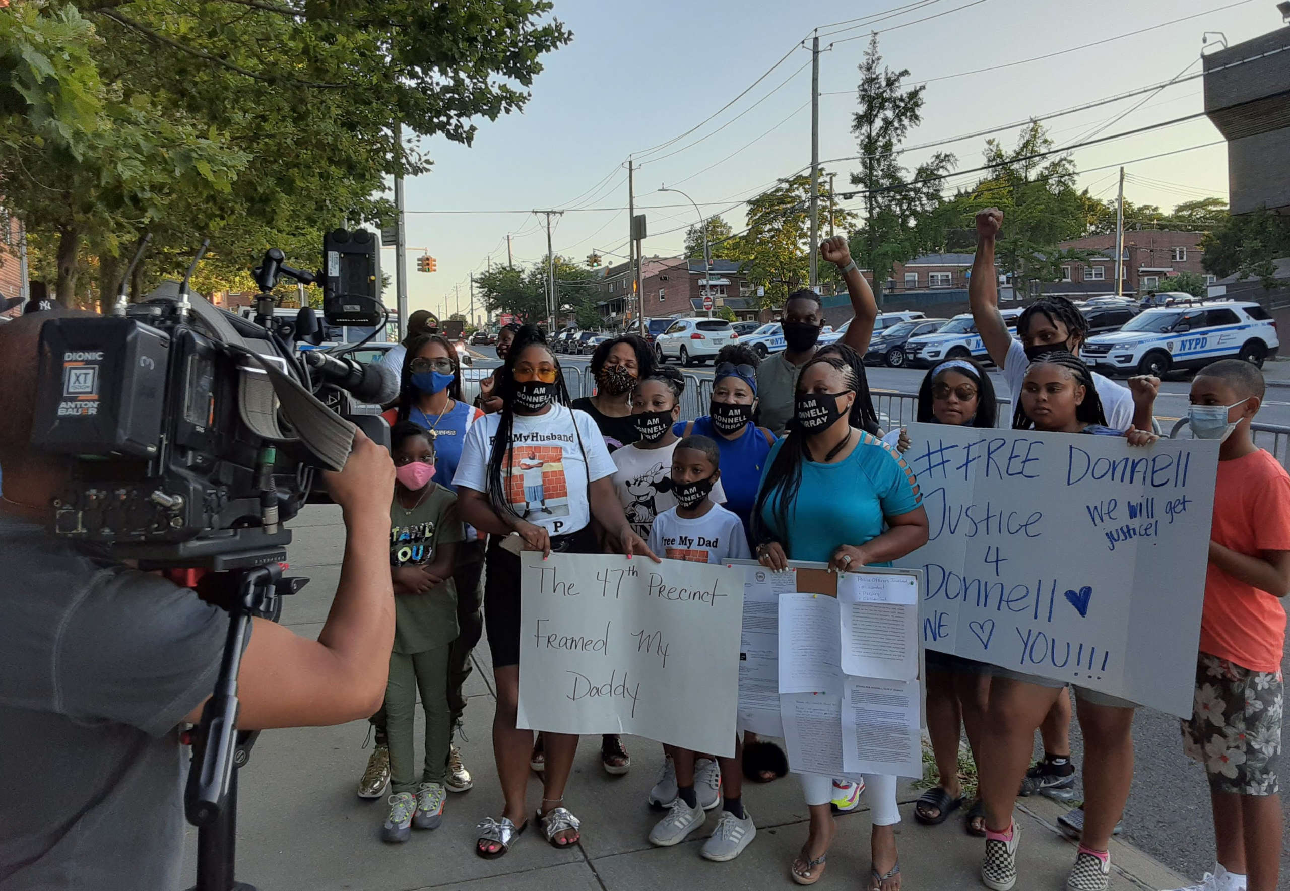 Donnell Murray's family and supporters at a protest outside the NYPD's 47th Precinct, May 2020.