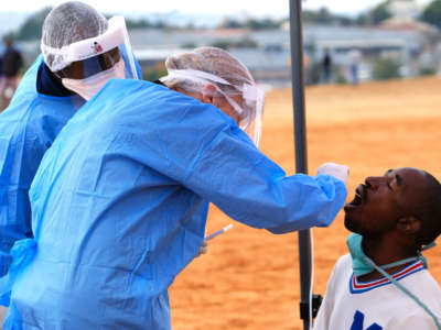 Health workers conduct swabs during intensified testing and screening on Freedom Day on April 27, 2020, in Alexandra, Gauteng, in South Africa.