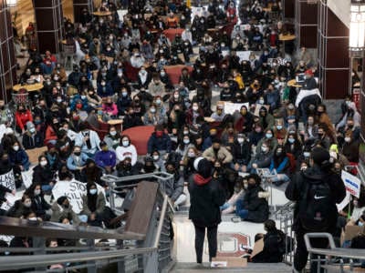 Black Lives Matter activist addresses participants in the mass sit-in on the Ohio State University (OSU) campus during the demonstration. Students staged a sit-in demonstration in reaction to the police shooting and killing of Ma'Khia Bryant, 16, the day before. Activists demanded that OSU sever ties with the Columbus Police Department to keep BIPOC students safe.