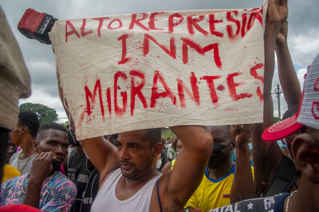 Haitian and Central American migrants protest