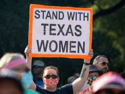 Demonstrators rally against anti-abortion and voter suppression laws at the Texas State Capitol on October 2, 2021, in Austin, Texas.