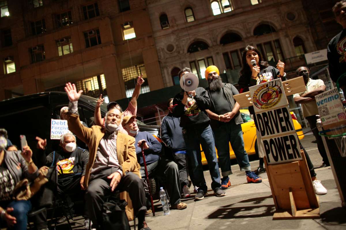 Yellow cab drivers attend a rally demanding debt forgiveness for cabbies, along with some drivers taking part in a hunger strike, outside City Hall in New York City, on October 20, 2021.