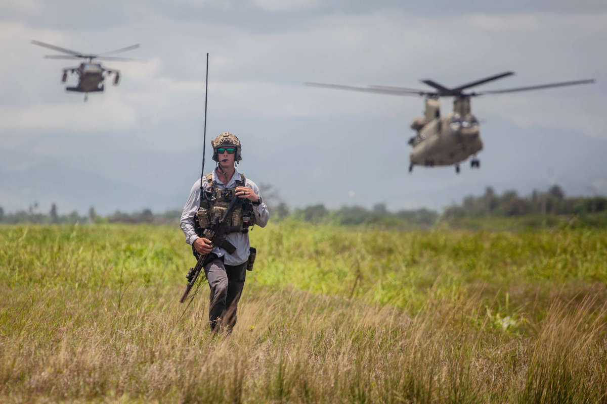 A U.S. Army officer walks through Antoine-Simon Airport airport on August 20, 2021, in Les Cayes, Haiti.