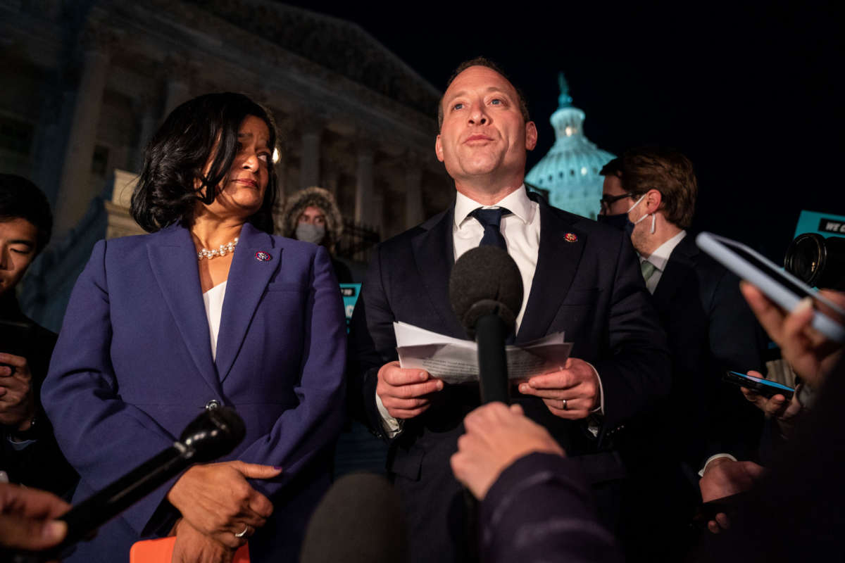 Rep. Pramila Jayapal (D-Washington) and Rep. Josh Gottheimer (D-New Jersey) speak during a news conference on the steps of the House of Representatives on Friday, Nov. 5, 2021 in Washington, D.C.