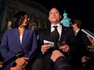 Rep. Pramila Jayapal (D-Washington) and Rep. Josh Gottheimer (D-New Jersey) speak during a news conference on the steps of the House of Representatives on Friday, Nov. 5, 2021 in Washington, D.C.