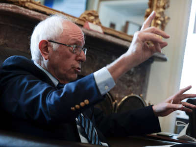 Sen. Bernie Sanders gestures as he speaks during a pen and pad news conference at the U.S. Capitol on October 8, 2021, in Washington, D.C.