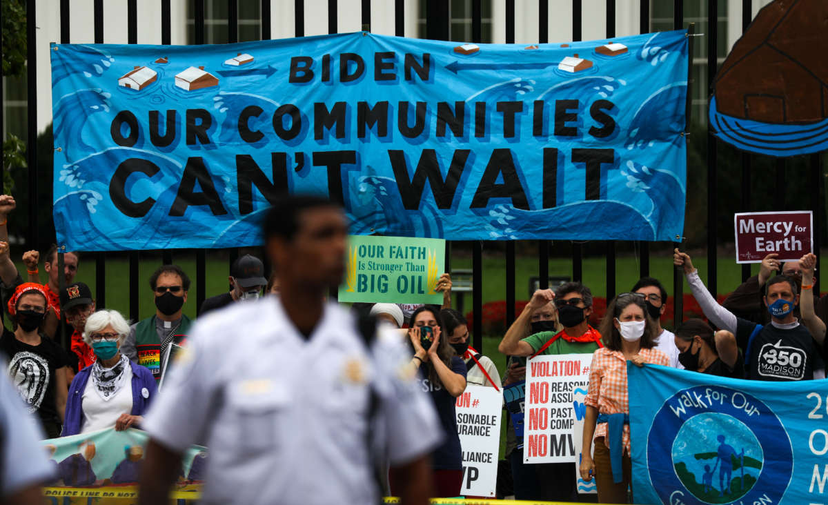 Native and other environmentalist groups gather outside the White House on the third day of "People vs. Fossil Fuels" protests in Washington, D.C., on October 13, 2021.