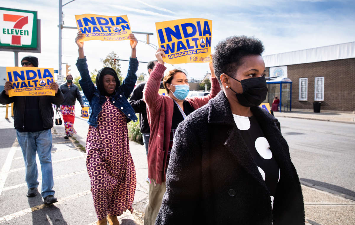 India Walton (in foreground on right), the Democratic Party nominee in the 2021 election for mayor of Buffalo, New York, walks to a polling place with supporters on October 28, 2021.