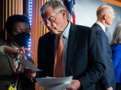 Ranking member Sen. Jim Inhofe speaks with an aide during a news conference with Republican members of the Senate Armed Services Committee on Afghanistan in the U.S. Capitol on September 14, 2021.