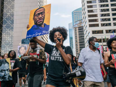 People celebrate the sentencing of former Minneapolis police officer Derek Chauvin on June 25, 2021, in Minneapolis, Minnesota.