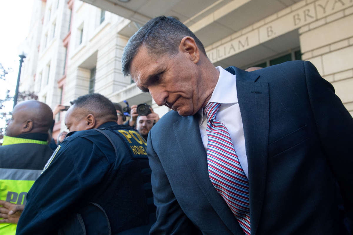 Former National Security Advisor General Michael Flynn leaves after the delay in his sentencing hearing at U.S. District Court in Washington, D.C., December 18, 2018.