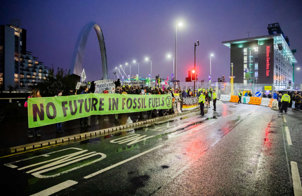 People protest for better climate protection on the sidelines of the UN Climate Change Conference COP26 in Glasgow on November 8, 2021.