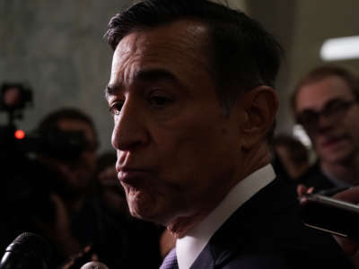 Rep. Darrell Issa speaks to members of the media at a hallway of the Rayburn House Office Building on Capitol Hill on December 7, 2018, in Washington, D.C.