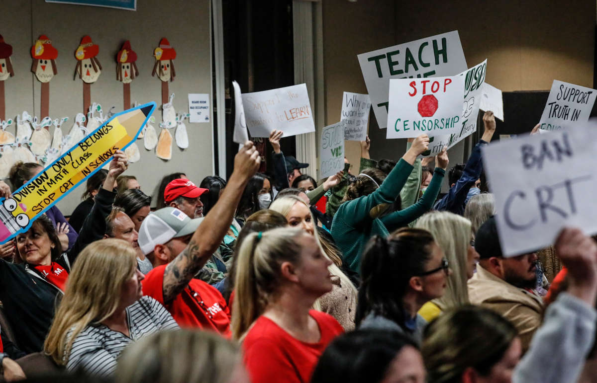 A mix of proponents and opponents to teaching Critical Race Theory are in attendance as the Placentia Yorba Linda School Board discusses a proposed resolution to ban it from being taught in schools in Yorba Linda, California, on November 16, 2021.