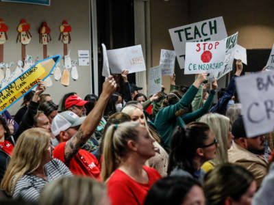A mix of proponents and opponents to teaching Critical Race Theory are in attendance as the Placentia Yorba Linda School Board discusses a proposed resolution to ban it from being taught in schools in Yorba Linda, California, on November 16, 2021.