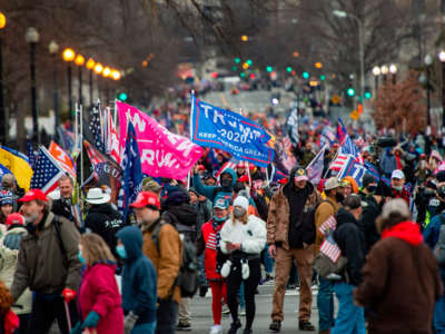 January 6th capitol rioters march together