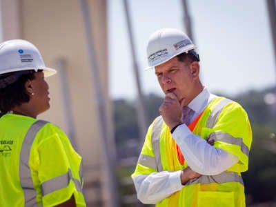 DC Mayor Muriel Bowser talks with Secretary of Labor Marty Walsh