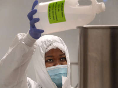 An employee at the biotechnology company Afrigen works in a manufacturing laboratory in Cape Town.