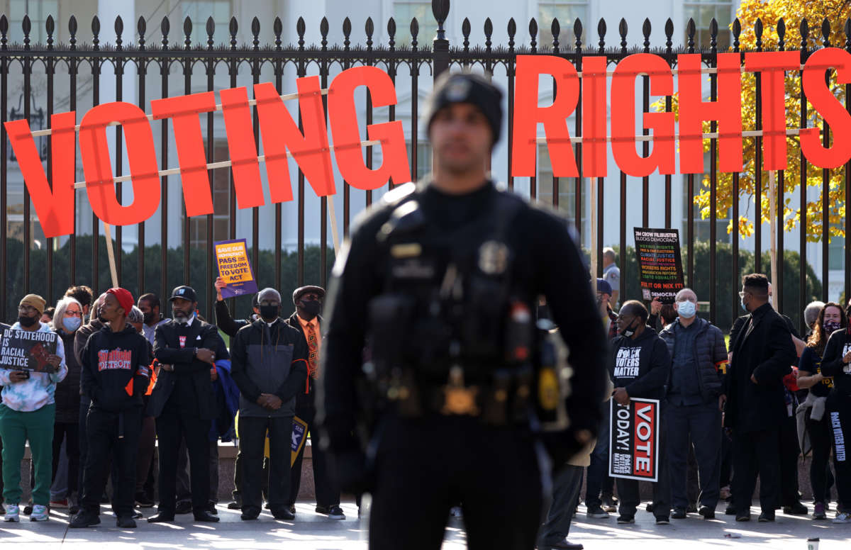 Activists take part in a voting rights protest in front of the White House on November 17, 2021, in Washington, D.C.