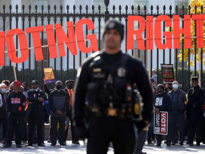 Activists take part in a voting rights protest in front of the White House on November 17, 2021, in Washington, D.C.