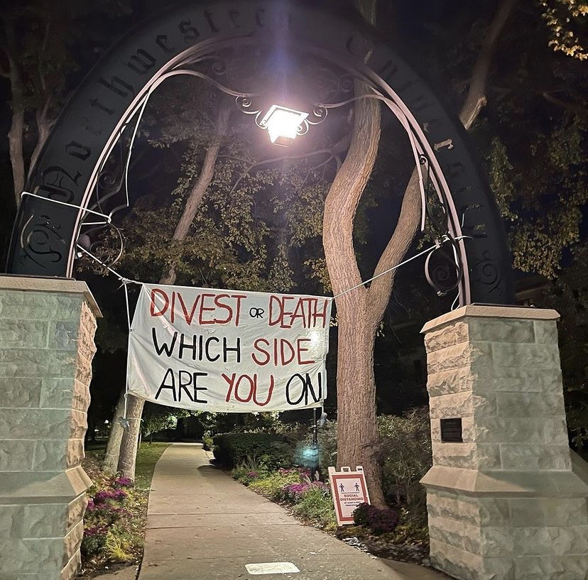 A banner dropped over an arch on Northwestern University’s campus.