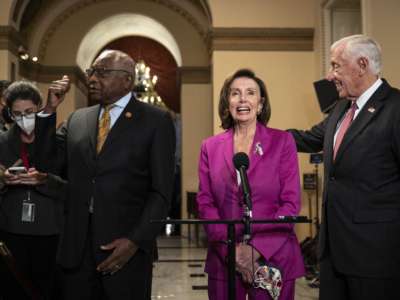 House Majority Whip Rep. James Clyburn, Speaker of the House Nancy Pelosi and House Majority Leader Rep. Steny Hoyer speak to reporters on their way to the House Chamber at the U.S. Capitol on November 5, 2021 in Washington, D.C.