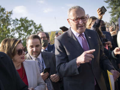 Speaker of the House Nancy Pelosi and Senate Majority Leader Chuck Schumer leave a news conference with House Democrats about the Build Back Better legislation, outside of the U.S. Capitol on November 17, 2021, in Washington, D.C.