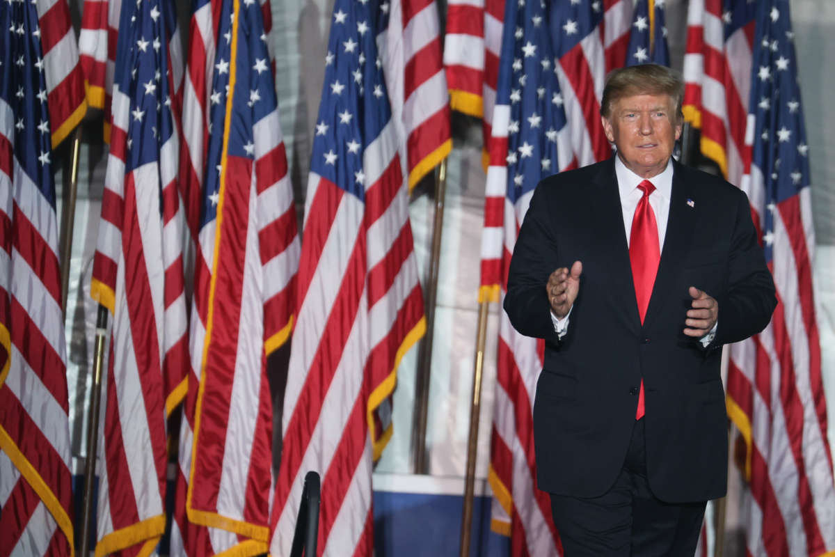 Former President Donald Trump arrives for a rally at the Iowa State Fairgrounds on October 9, 2021, in Des Moines, Iowa.