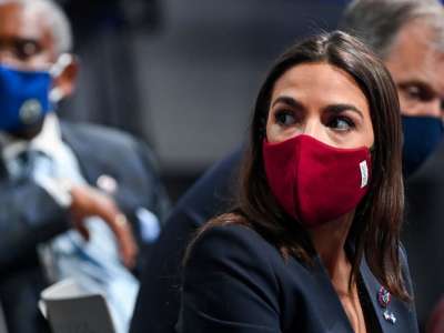 Alexandria Ocasio-Cortez attends a press conference during COP26 on November 10, 2021 in Glasgow, Scotland.