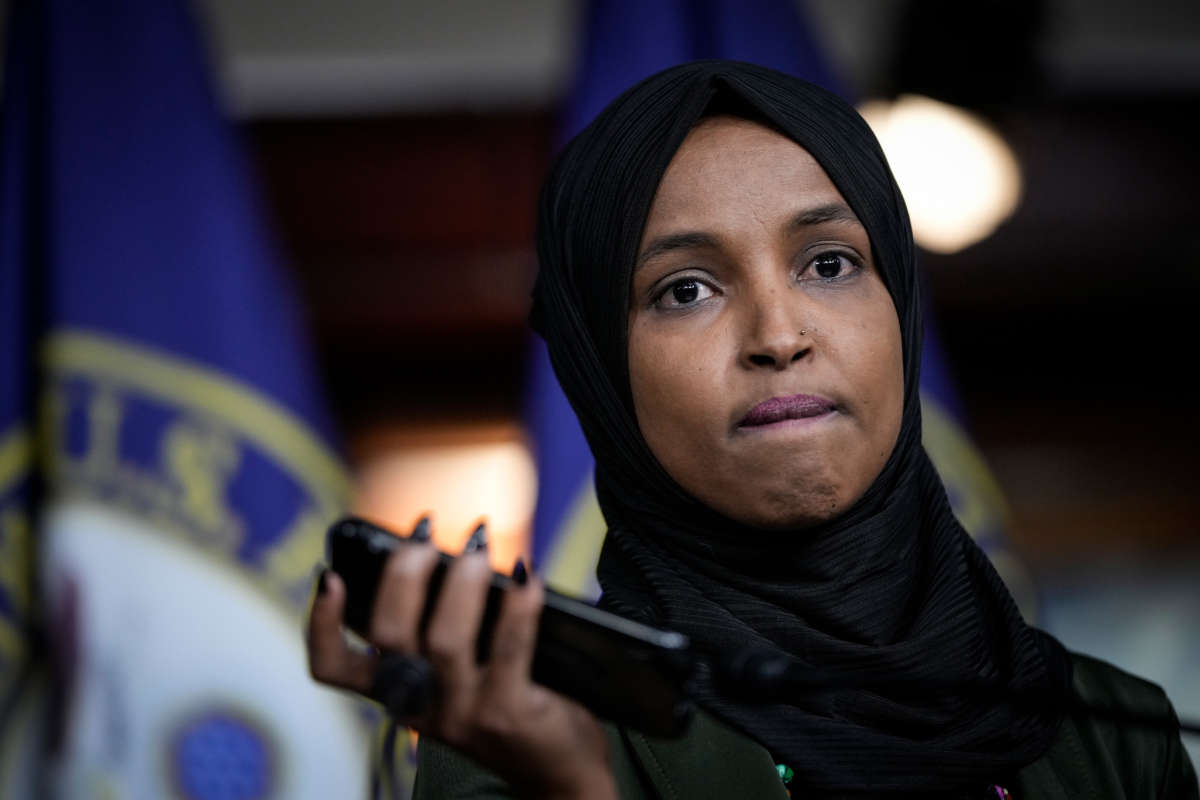 Rep. Ilhan Omar plays a voicemail containing a death threat during a news conference about Islamophobia on Capitol Hill on November 30, 2021, in Washington, D.C.