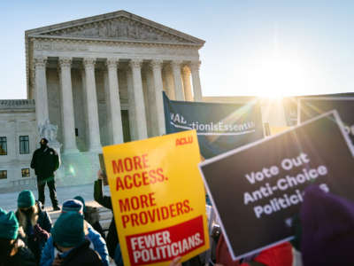 Abortion rights advocates and anti-abortion protesters demonstrate in front of the Supreme Court on December 1, 2021, in Washington, D.C.