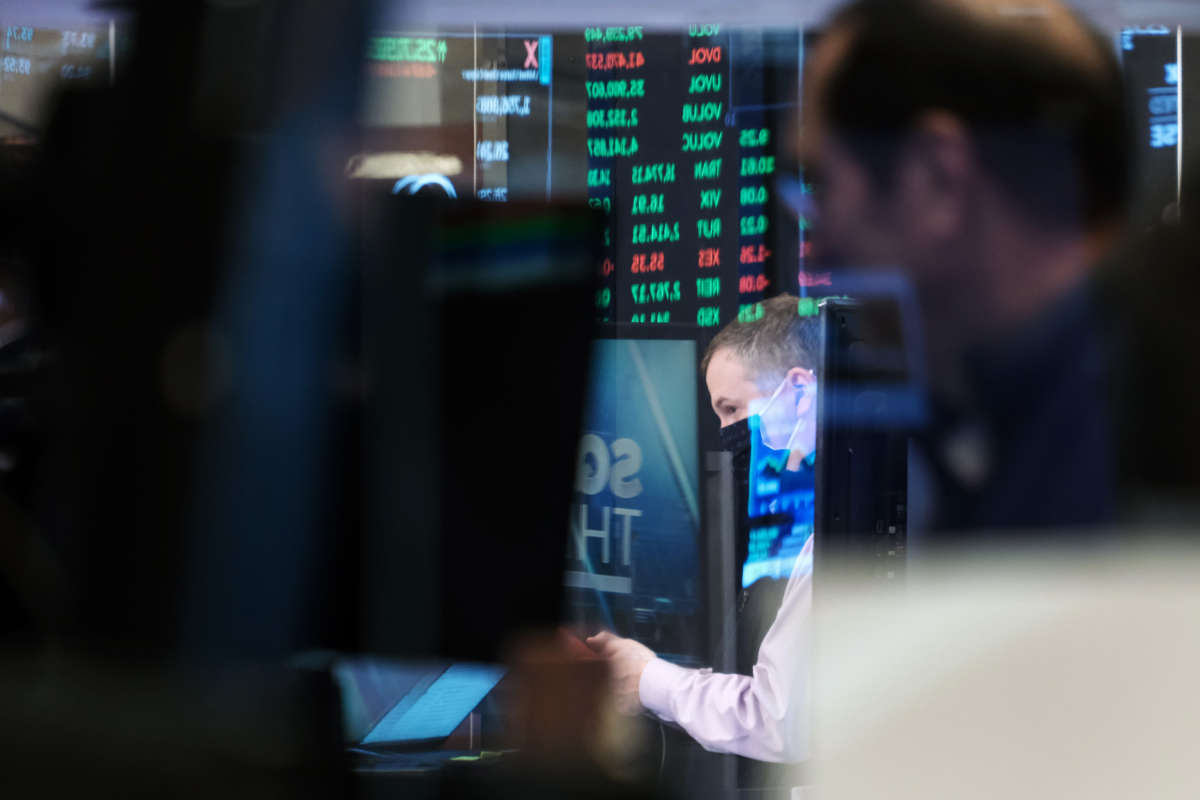 Traders work on the floor of the New York Stock Exchange (NYSE) on November 15, 2021, in New York City.