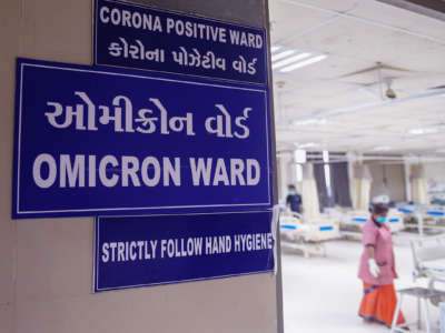 Nurses can be seen in the Omicron ward of a hospital