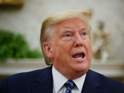 President Donald Trump speaks in the Oval Office of the White House on April 30, 2020, in Washington, D.C.