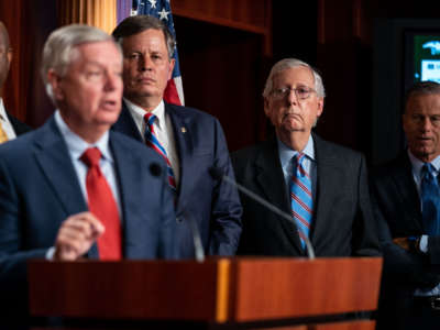 From left, Sen. Tim Scott, Sen. Lindsey Graham, Sen. Steve Daines, Senate Minority Leader Mitch McConnell, and Sen. John Thune hold a news conference on Capitol Hill on July 21, 2021.