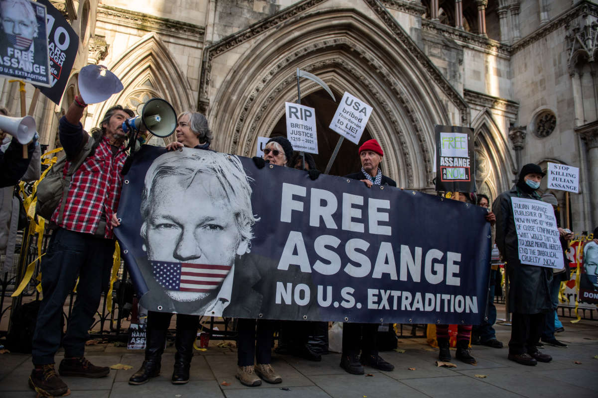 Supporters of Julian Assange outside the Royal Courts of Justice on December 10, 2021, in London, England.