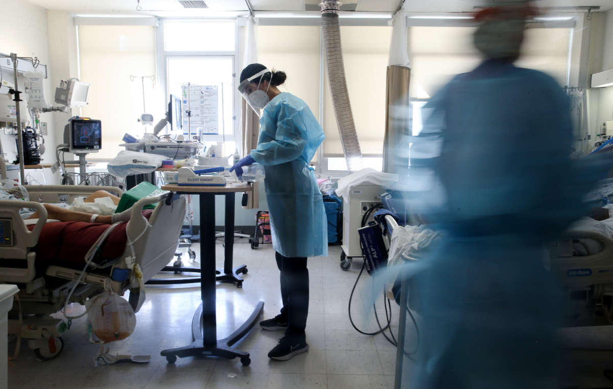 Nurses care for COVID-19 patients in a makeshift intensive care unit at Harbor-UCLA Medical Center on January 21, 2021, in Torrance, California.