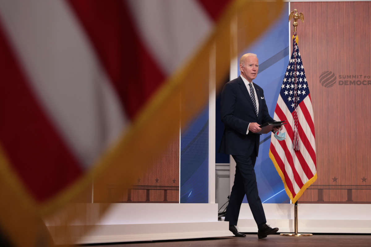 President Joe Biden takes the stage to deliver closing remarks for the White House's virtual Summit For Democracy in the Eisenhower Executive Office Building on December 10, 2021, in Washington, D.C.