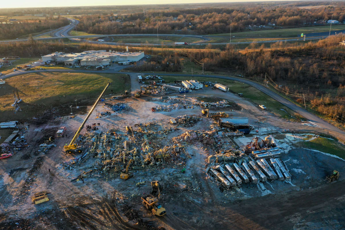 An aerial view of debris and structural damage is seen at the Mayfield Consumer Products candle factory as search and rescue operations underway after tornadoes hit Mayfield, Kentucky, on December 13, 2021.