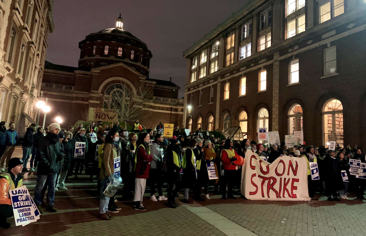 Student workers on strike participate in a picket action At Columbia University in New York on December 8, 2021.