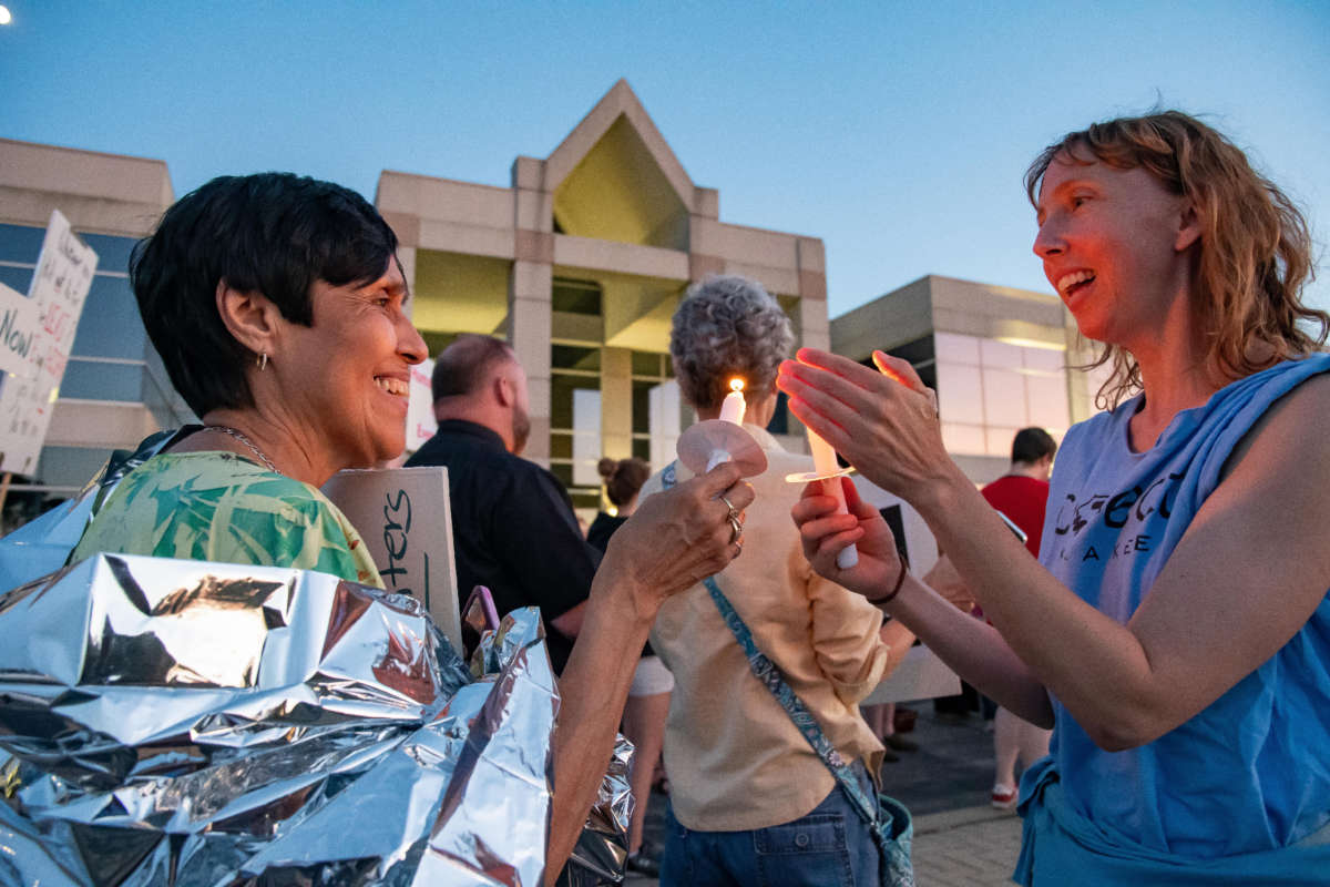 Members of Connect Kankakee, an immigrant solidarity group, hold a “Lights for Liberty” protest at Jerome Combs Detention Center on July 12, 2019.