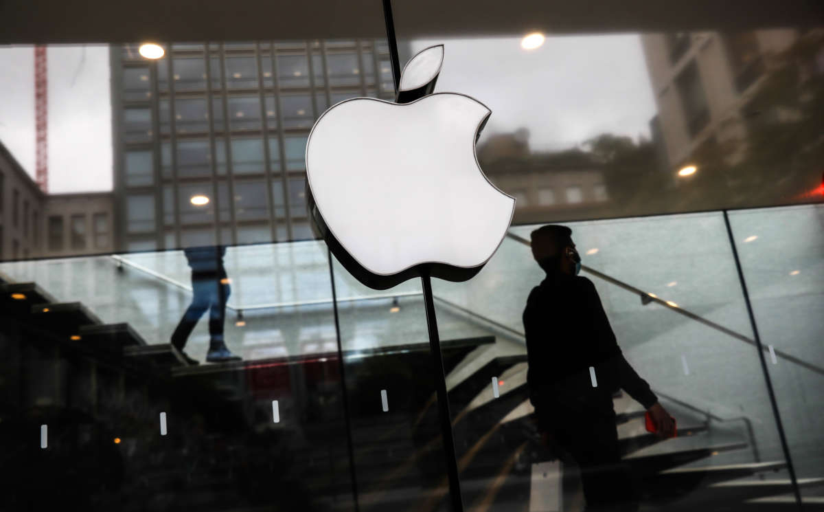 Apple logo is seen on the store in Milan, Italy, on October 6, 2021.